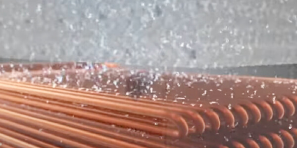 External cooling loop for heat dissipation, designed to protect the internal loop from contamination